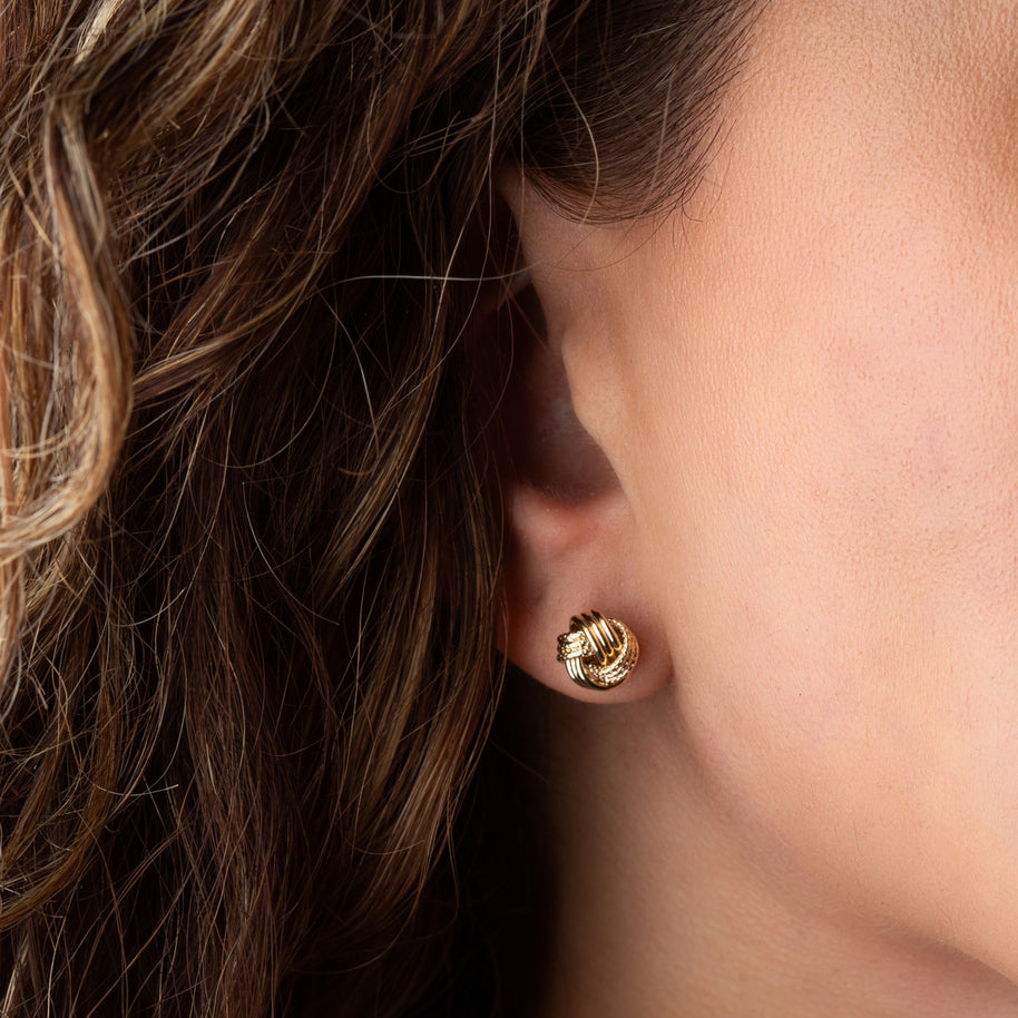 14K Yellow Gold Interlocking Love Knot Textured Stud Earrings