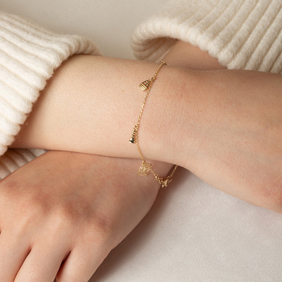 14K Yellow Gold Nautical Anchor Ocean Dolphin Charm Bracelet 7