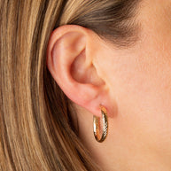 14K Yellow Gold Reversible Twisted Tube Hoop Earrings (Available in Small/Large)