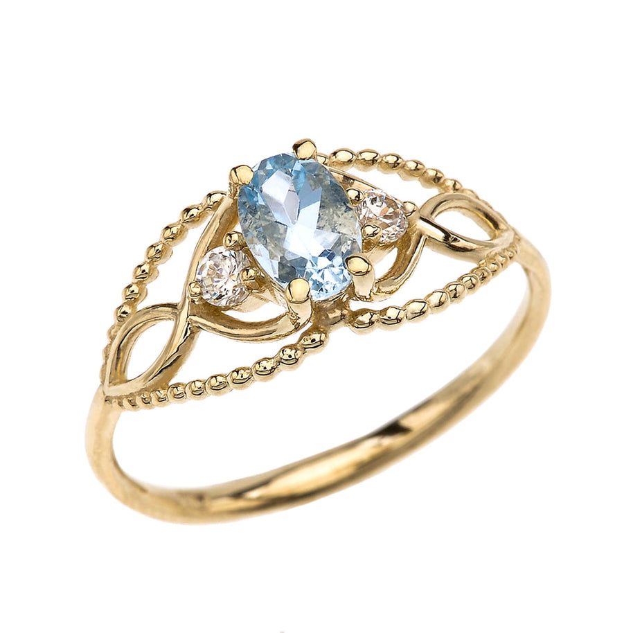 Elegant Beaded Solitaire Ring With Aquamarine Centerstone and White Topaz in Yellow Gold