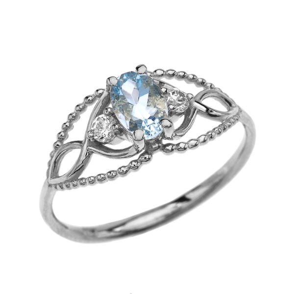 Elegant Beaded Solitaire Ring With Aquamarine Centerstone And White Topaz In White Gold