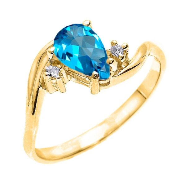 Yellow Gold Pear Shaped Blue Topaz And Diamond Proposal Ring