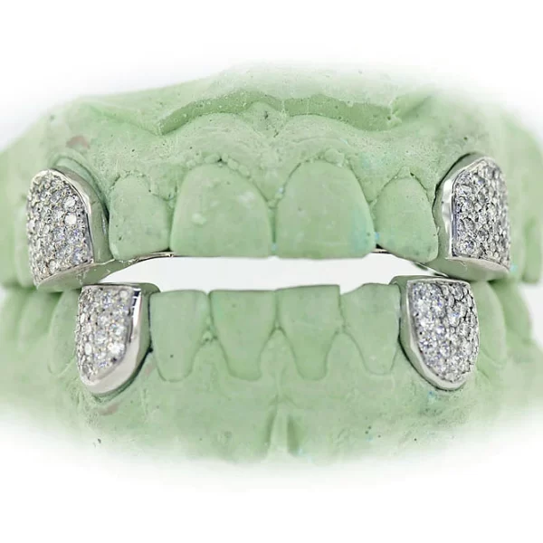 Hand Prong Set Diamond Canine Teeth